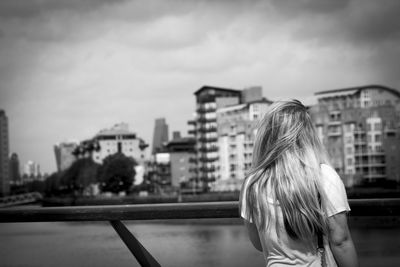 Rear view of horse in city