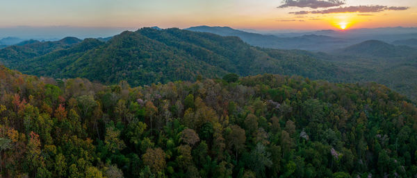 Scenic view of mountains against sky during sunset