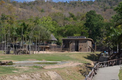 Abandoned building on field