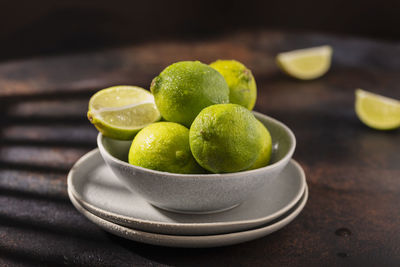 Close-up of fruits in plate on table