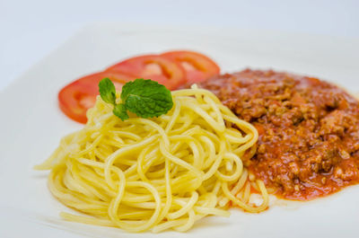 Close-up of noodles served in plate