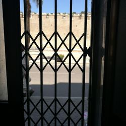 Scenic view of sea seen through glass window