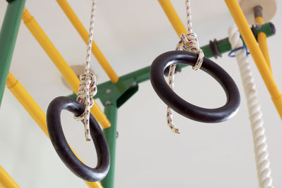 Close-up of chain hanging on rope