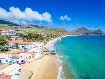 High angle view of beach against blue sky