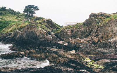 Rocky coastline against sky