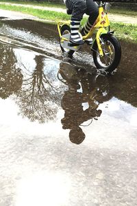 Reflection of people in water