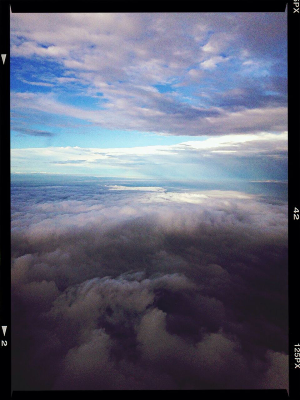 scenics, tranquil scene, beauty in nature, sky, tranquility, transfer print, cloud - sky, nature, auto post production filter, cloudscape, cloudy, idyllic, cloud, weather, aerial view, landscape, majestic, sky only, dramatic sky, outdoors