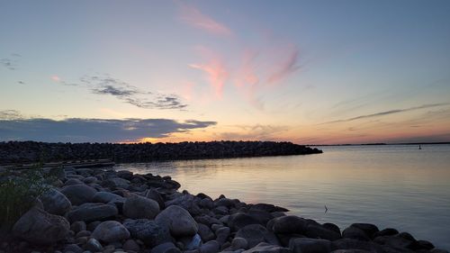 Scenic view of sea against sky during sunset