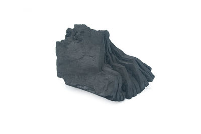 High angle view of rock against white background