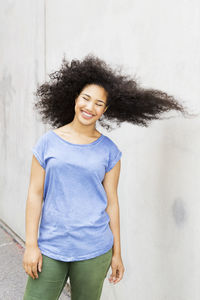 Teenage girl tossing hair, stockholm, sweden