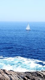 Scenic view of sea against clear sky