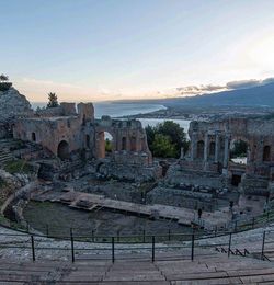 Old ruins against sky during sunset