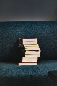 Stack of books on table at home