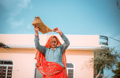 Portrait of an  indian rural woman doing daily chores