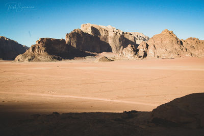 Scenic view of desert against sky