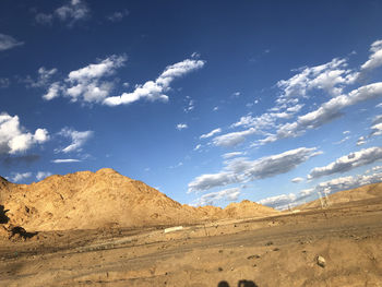 Scenic view of desert against sky