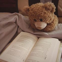 High angle view of stuffed toy on bed at home