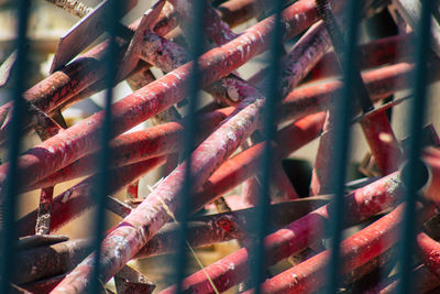 View of metallic pipes seen through window