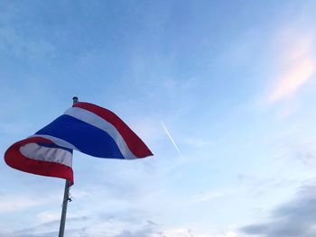 Low angle view of flag against sky