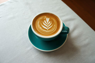 Close-up of cappuccino on table