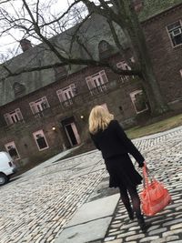 Woman standing in city