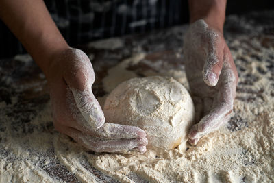 Midsection of person preparing food