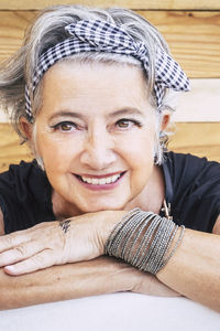 Portrait of young woman relaxing at home