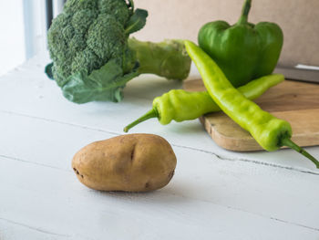 High angle view of vegetables on cutting board