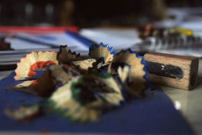 Close-up of colored pencils on table