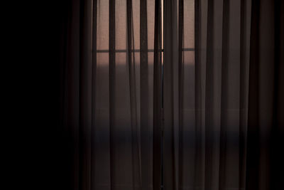 Close-up of curtain on window