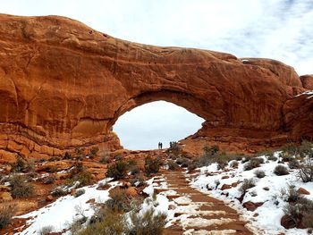 Rock formations on snow covered land