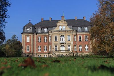 Low angle view of built structure against clear sky