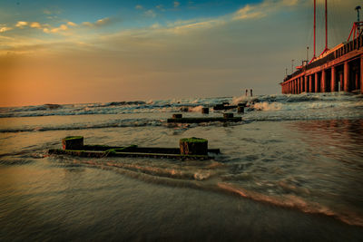 Scenic view of sea against cloudy sky