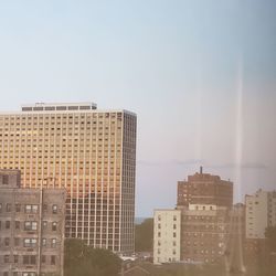 Modern buildings against clear sky