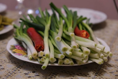 Close-up of chopped vegetables in plate on table