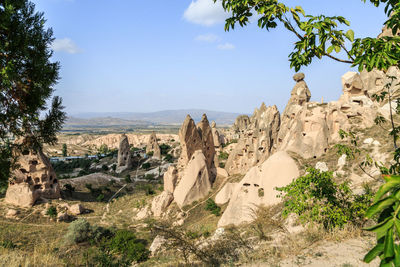 Panoramic view of rock formations against sky