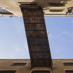 Low angle view of old building against sky