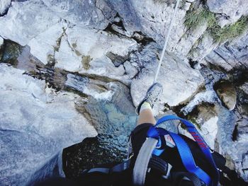 Low section of person in cave