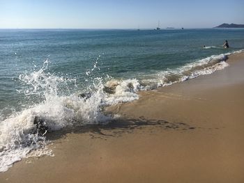 Scenic view of sea against clear sky