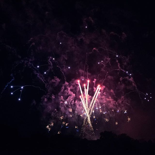 night, illuminated, celebration, firework display, exploding, glowing, event, arts culture and entertainment, firework - man made object, motion, light - natural phenomenon, firework, sparks, low angle view, long exposure, purple, outdoors, no people, entertainment, sky