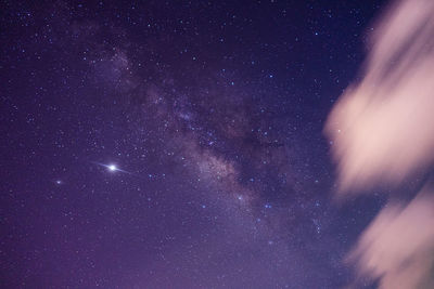 Low angle view of star field against sky at night