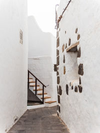 Rear view of woman walking in building