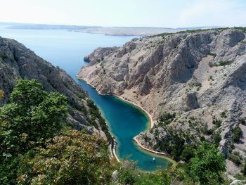 High angle view of calm sea against clear sky