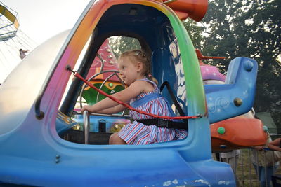 Cute girl playing in playground