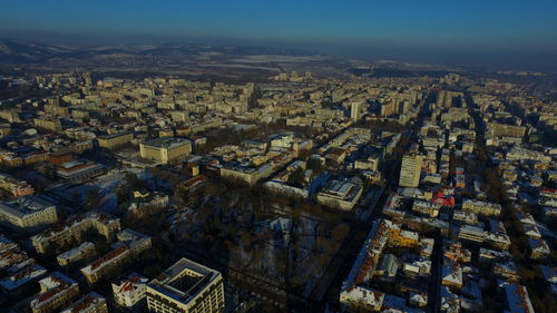 Aerial view of cityscape against sky