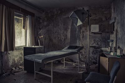 Interior of abandoned operating room in hospital