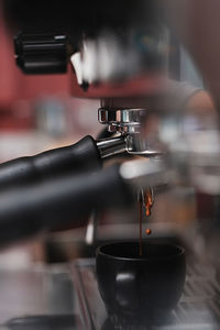 Close-up of coffee cup in cafe