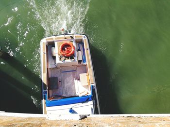 High angle view of boat sailing on lake