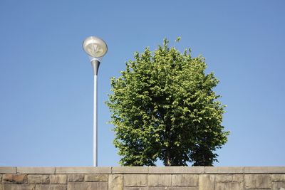 Low angle view of street light against clear sky