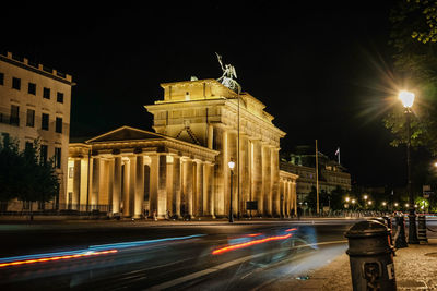 Light trails on city street at night